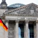 a flag in front of a building